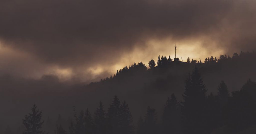 Atmospheric spooky house on a hill